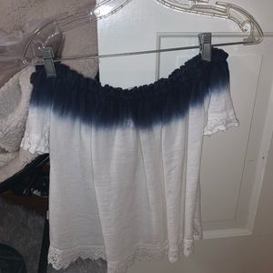 Super cute off the shoulder vestique top!